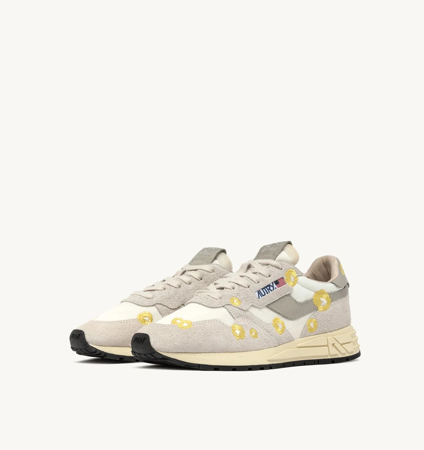 REELWIND LOW SNEAKERS IN WHITE AND BUTTERCUP EMBROIDERY