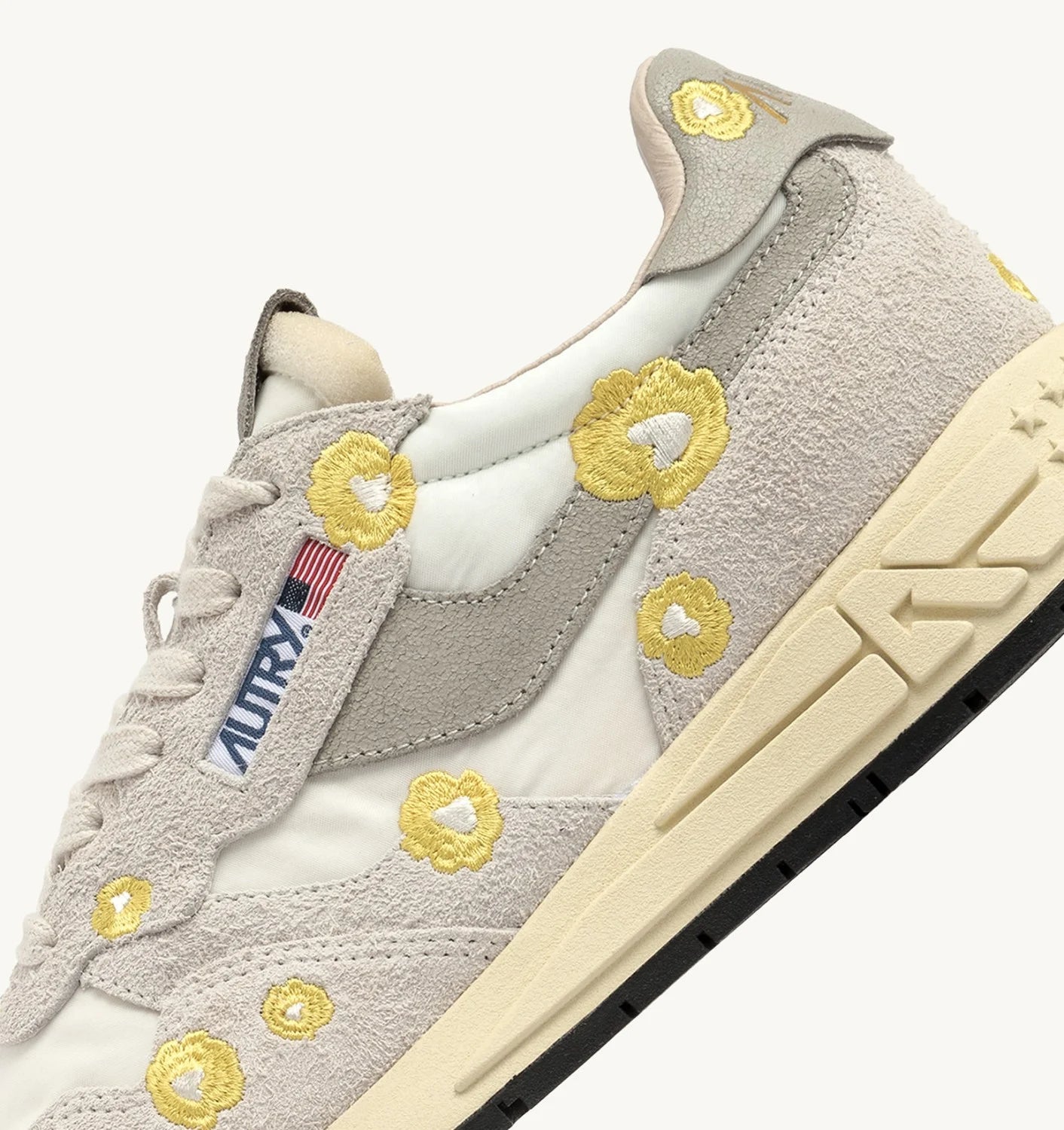 REELWIND LOW SNEAKERS IN WHITE AND BUTTERCUP EMBROIDERY