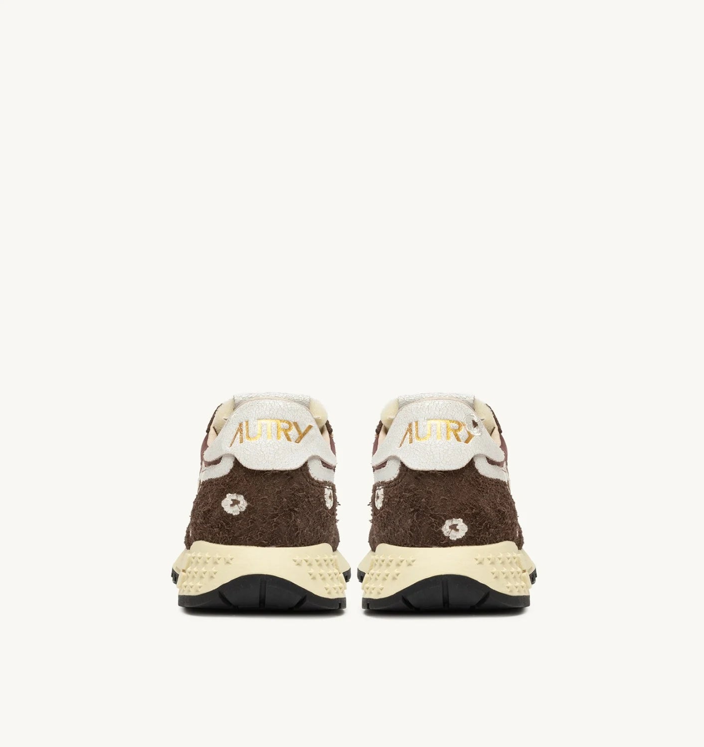 REELWIND LOW SNEAKERS IN EBONY AND WHITE EMBROIDERY